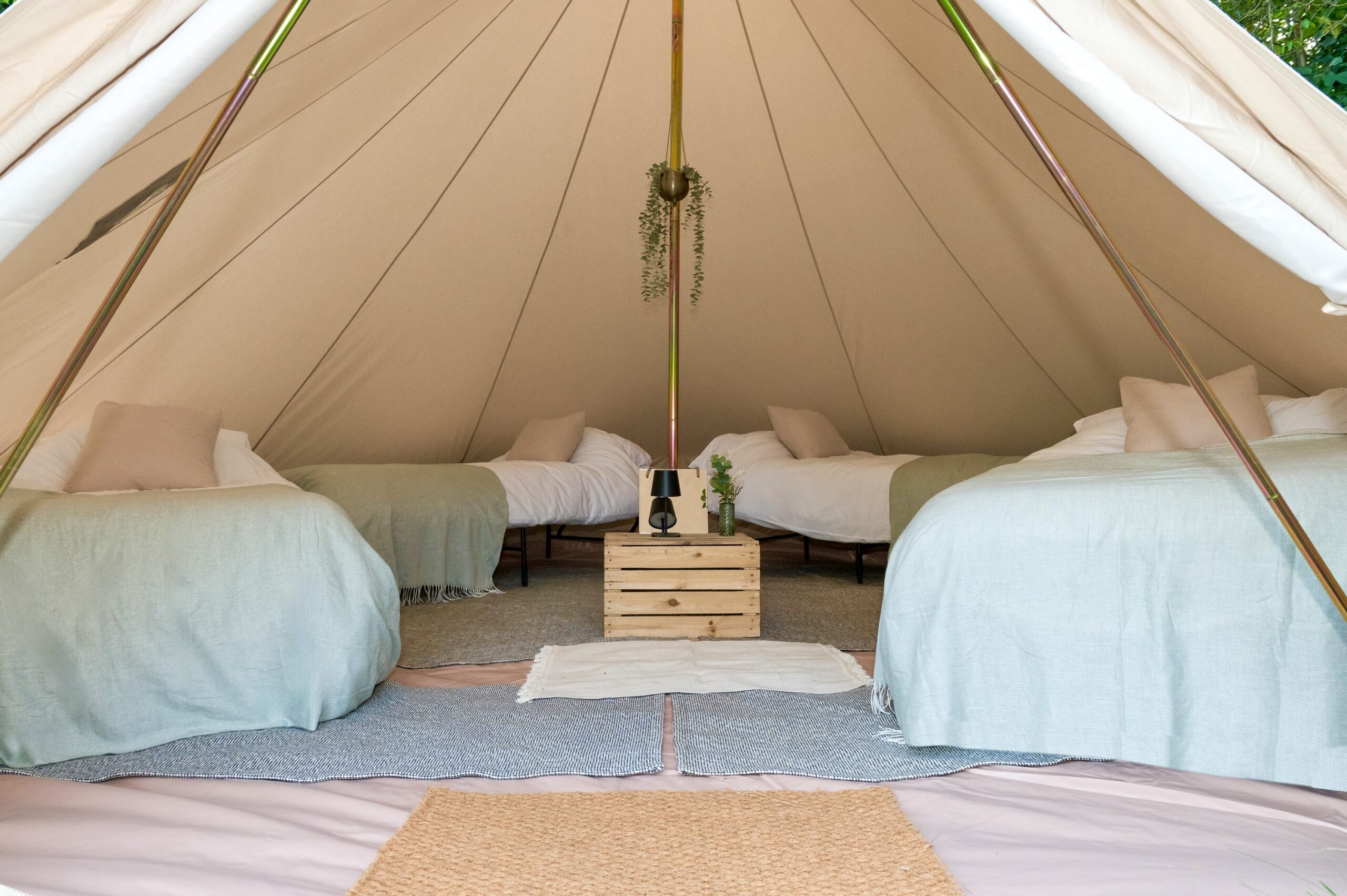 Single memory foam beds in a bell tent